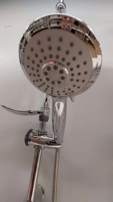 Modern chrome shower head with adjustable spray settings Stock Footage 333643352