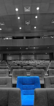 Modern cinema hall empty and blue grey comfortable seats Stock Photos