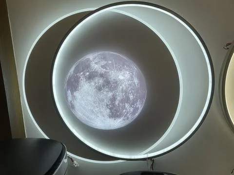 Modern Circular LED Ceiling Light with Realistic Moon Design Stock Photos