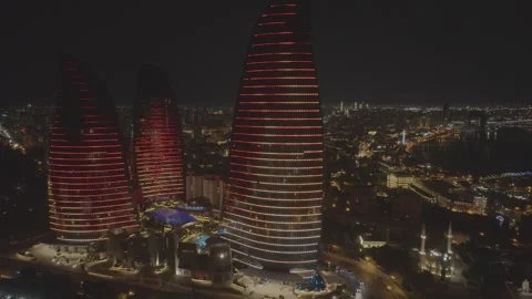 Modern City Buildings at Night with Dynamic Light Show Stock Footage 341882608