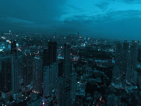Modern city during beautiful cloudy night Stock Footage 77322313
