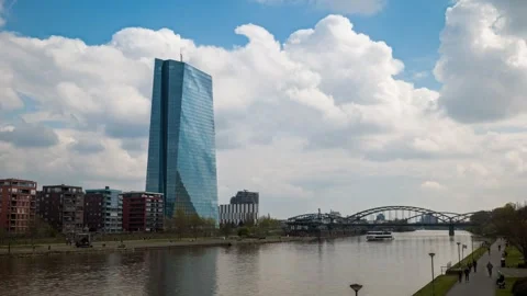 Modern City Skyscraper Overlooking a River Bridge with People Walking by 库存影片 331103773