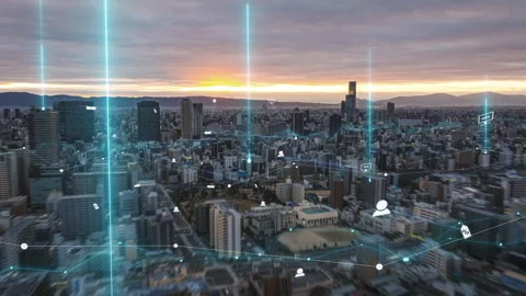 Modern city at sunset with dynamic data visualization overlays, showcasing 스톡 동영상 276107653