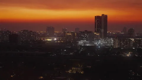 Modern City Sunset View with Illuminated Buildings 動画素材 337533789