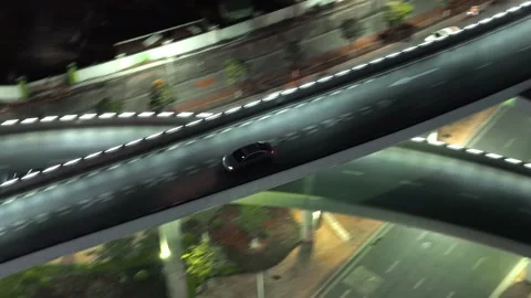 Modern cityscape with car ride multi level road on highway overpass, urban life. Video stock 330466882