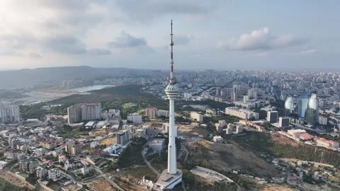 Modern Cityscape with Communication Tower and Coastal Bay View Stock Footage 341904205