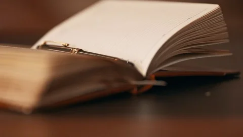 Modern classic workplace with key and pen on notepad. Video stock 99560816