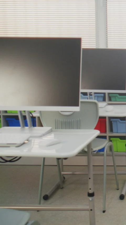 Modern Classroom Setup with PC Monitors for Students to Practice Coding, Design Stock Footage 317161739