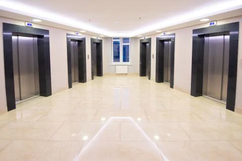 Modern clean elevator hall of apartment buidling Stock Photos