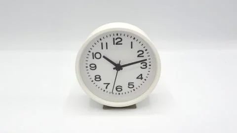 Modern clean white clock. Stock Photos