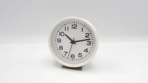 Modern clean white clock. Stock Photos