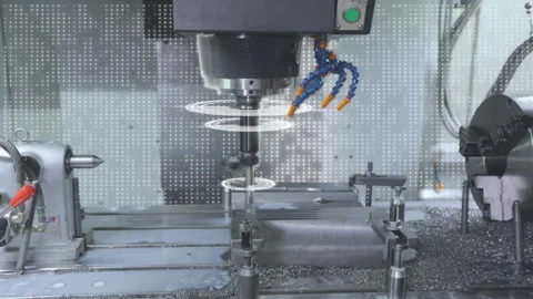 Modern cnc machine. Processing a part in a factory. Metal processing on a cnc Stock Footage 296644497