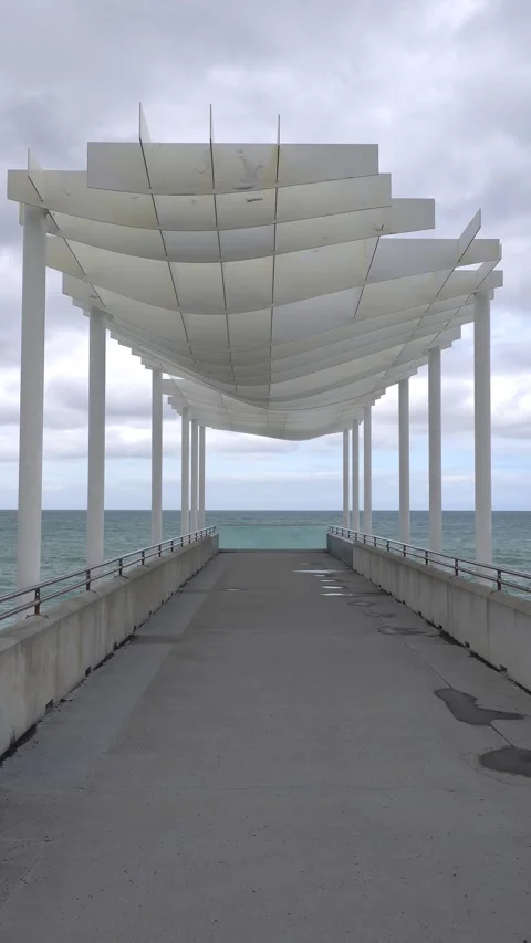 Modern coastal structure with ocean view Stock Footage 312516977