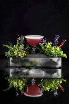 Modern coctail reflection on the black background Stock Photos