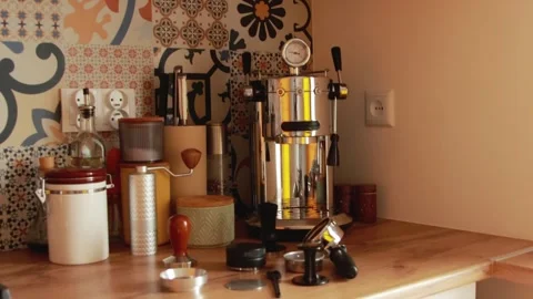Modern coffee corner in a cozy kitchen with a shiny espresso machine, grind.. Stock Footage 342036018