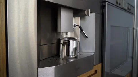 A Modern Coffee Machine Designed in a Chic and Sleek Kitchen Environment for the Video stock 291023706