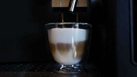 Modern Coffee Machine Making a Cappuccino Coffee Stock Footage 191936540