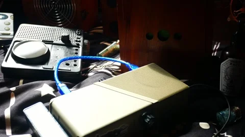 Modern collection of paranormal ghost box EVP communication devices 動画素材 247681838