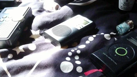 Modern collection of rare paranormal ghost box EVP communication devices Stock Footage 247681844