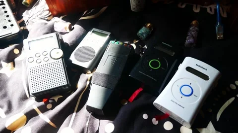 Modern collection of rare paranormal ghost box EVP communication devices 動画素材 247681889