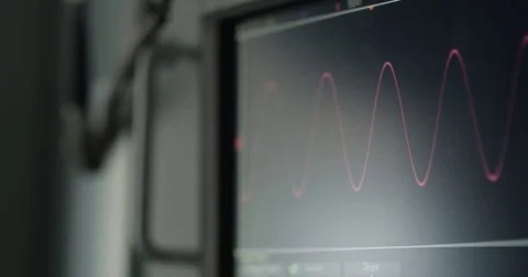 Modern colored sine curve graph on an oscilloscope 動画素材 76050030