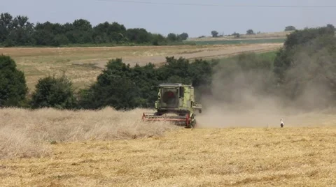 Modern combine harvester at work Stock Footage 40653436