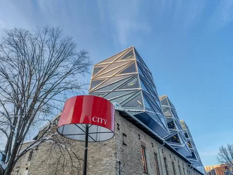 A modern combined old house with elements of a modern new house and a city sign Stock Photos