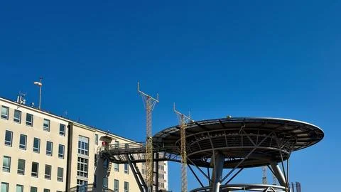 A Modern Communication Tower Set Against a Clear Blue Sky, Showcasing Urban.. Stockfoto's