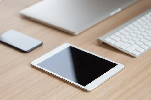 Modern communicator device on desk side view Stock Photos