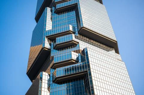 Modern complex octagonal geometric glass building exterior facade beautifully Stock Photos
