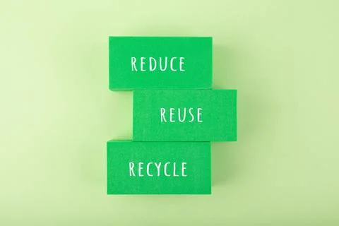 Modern composition with reduce, reuse, recycle inscription against light green Stock Photos
