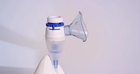 Modern compressor nebulizer with face mask. Stock Footage 169961672