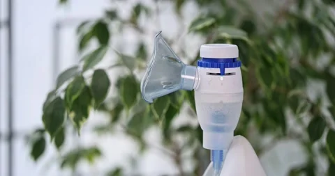 Modern compressor nebulizer with face mask. Stock Footage 169961714