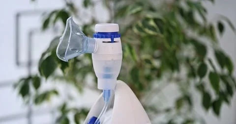 Modern compressor nebulizer with face mask. Stock Footage 169961761