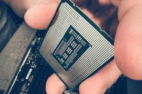 Modern Computer Chip in Technician Hand Stock-Fotos