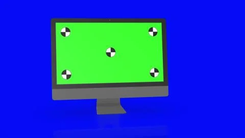 Modern computer with green screen, isolated on blue background . 3d render. Stock Illustration