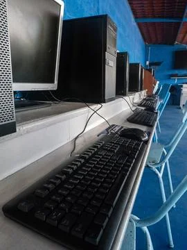 Modern computer laboratory with desktop computers in an educational instituti Stock Photos