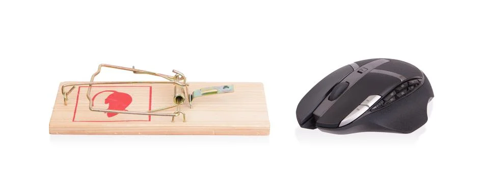 Modern computer mouse in a mousetrap Stock Photos