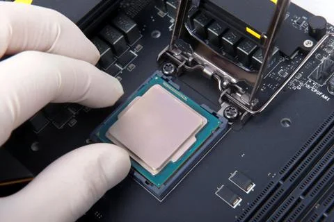 Modern computer processor and motherboard Stock Photos