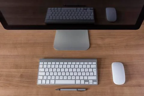 Modern computer screen with keyboard and mouse Stock Photos