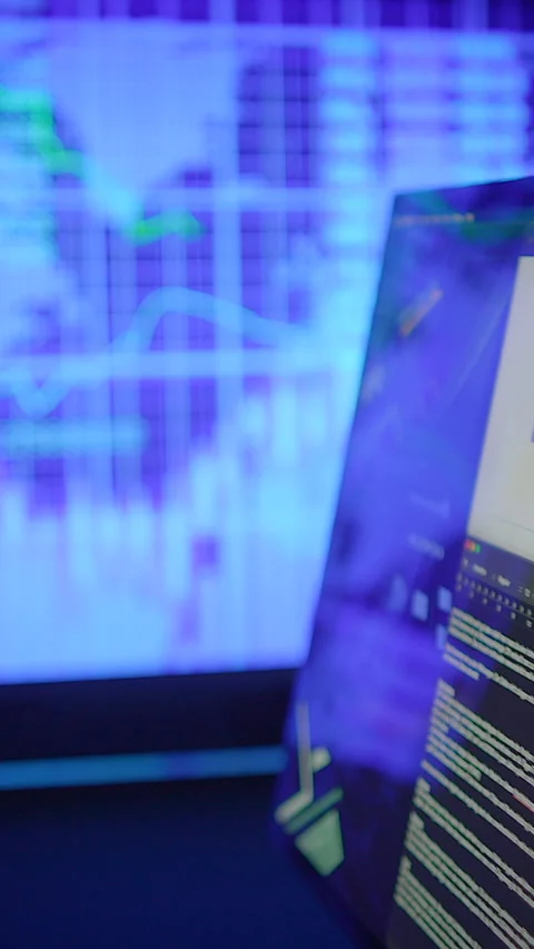 A modern computer setup displayed with a vibrant and captivating digital Stock Footage 295435874