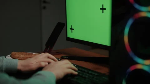 Modern Computer Setup with Green Screen and RGB Gaming PC Stock Footage 306425115