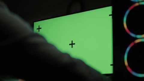 Modern Computer Setup with Green Screen and RGB Gaming PC Stock Footage 306425169