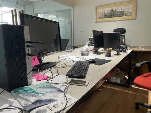  Modern computer on table in office interior. Stylish workplace office room Stock Photos