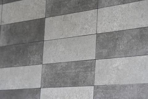 Modern concrete tile pattern creates a sleek, contemporary backdrop for des.. Stock Photos