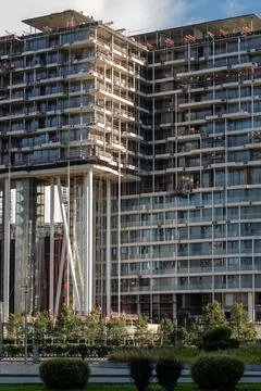 Modern Construction Project Showcasing a High-Rise Building Under Development in Stock Photos