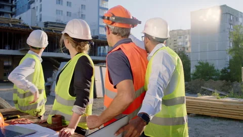 Modern construction site group of diverse specialists at the pandemic with Video stock 146606008