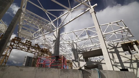 Modern Construction Site with Steel Framework and Scaffolding Stock Footage 305739558