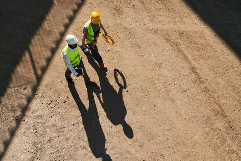 Modern constructors working on new house Stock Photos