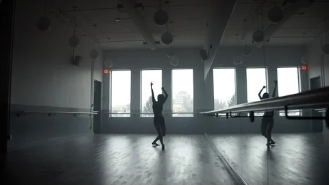 Modern contemporary dancer dancing in dance studio, wide push in 스톡 동영상 104269308